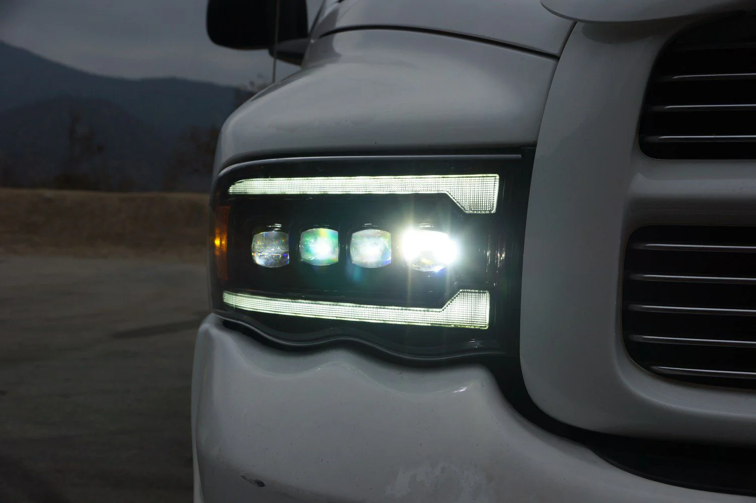 AlphaRex LED Projector Headlights Dodge Ram (02-05) [3D Ice-Cube LED - NOVA Series w/ DRL] Black / Chrome / Jet Black - Image 21