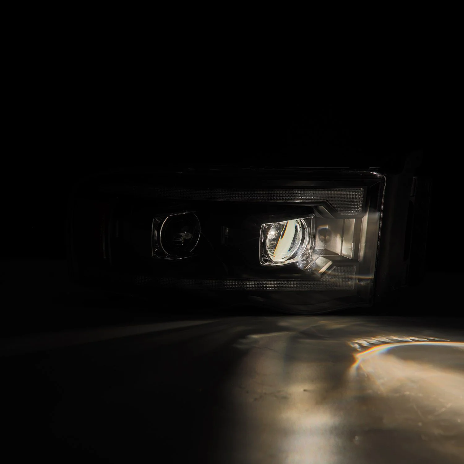 AlphaRex Projector Headlights Dodge Ram (02-05) Pro Series - Sequential - Alpha-Black / Black / Chrome - Image 6