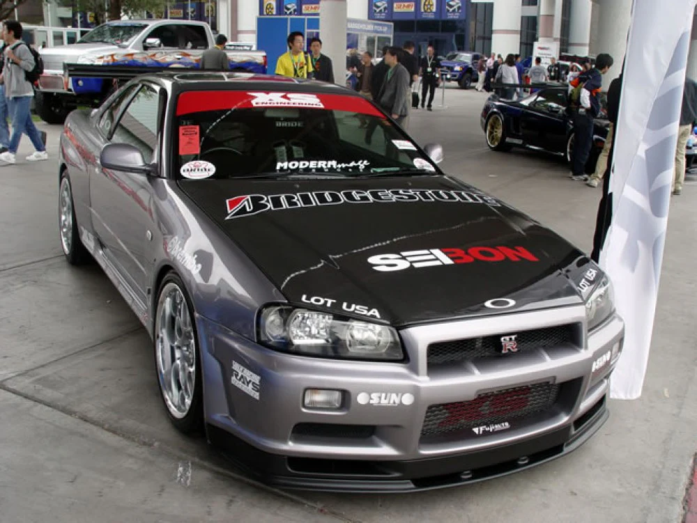SEIBON Carbon Fiber Hood Nissan Skyline GT-R R34 (99-02) DS Vented or OEM Style - Image 4
