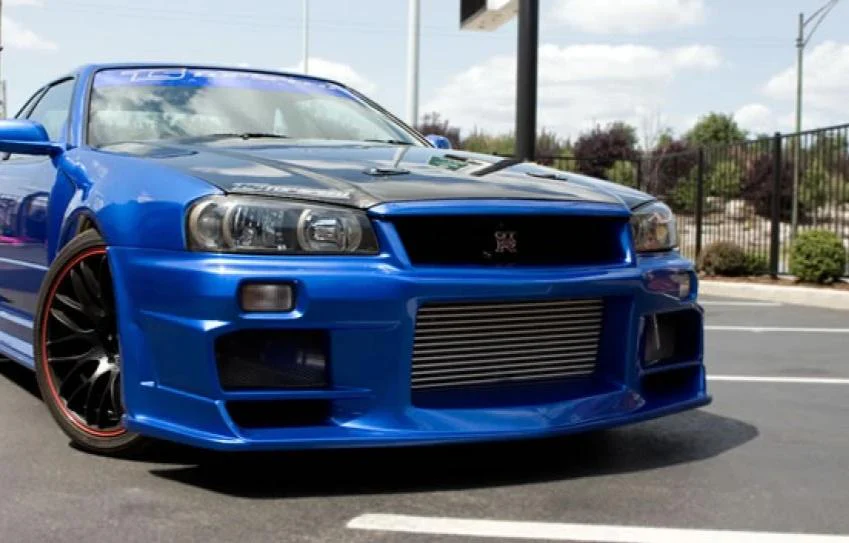 SEIBON Carbon Fiber Hood Nissan Skyline GT-R R34 (99-02) DS Vented or OEM Style - Image 5
