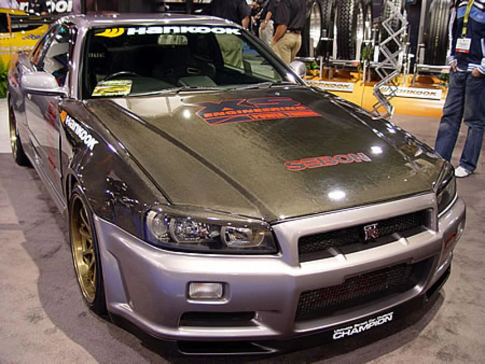 SEIBON Carbon Fiber Hood Nissan Skyline GT-R R34 (99-02) DS Vented or OEM Style - Image 6